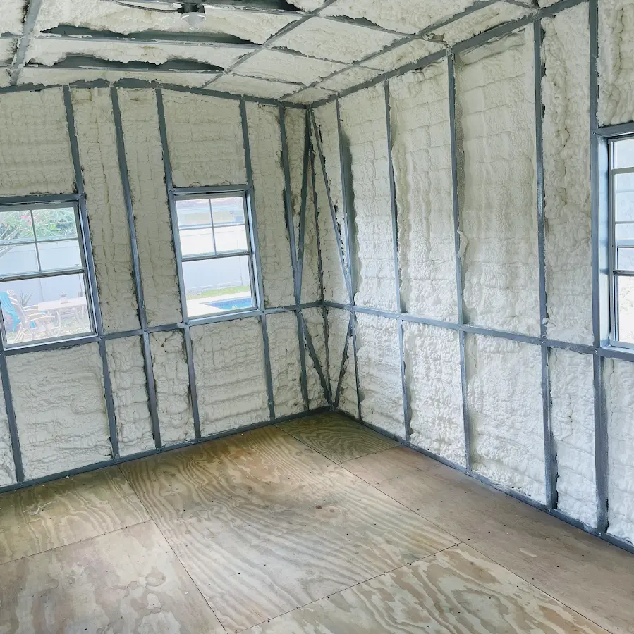 Closed-cell spray foam insulation applied to wall cavities in a residential project in Carol Stream